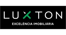 Luxton Excelência Imobiliária logo