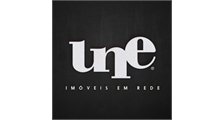 UNE - Imóveis logo