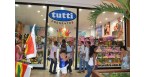 Tutti Presentes Logo